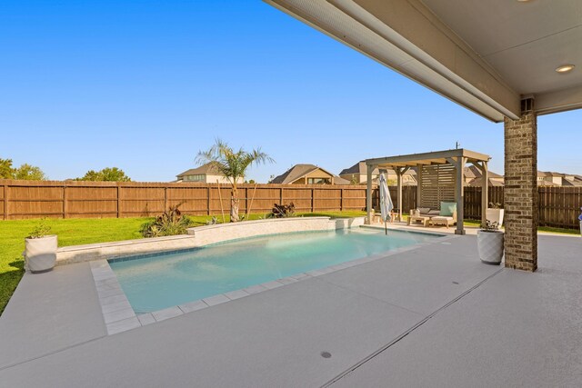 view of swimming pool featuring a fenced backyard, a fenced in pool, a patio, and a yard