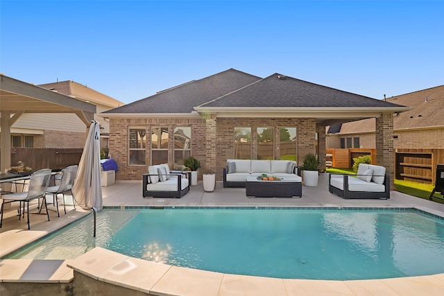 view of pool with fence, an outdoor living space, a patio area, and a fenced in pool