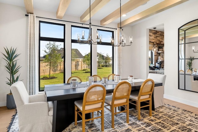 14127 Coyote Pointe Dr, Cypress, TX 77433 - dining space with beamed ceiling and a chandelier