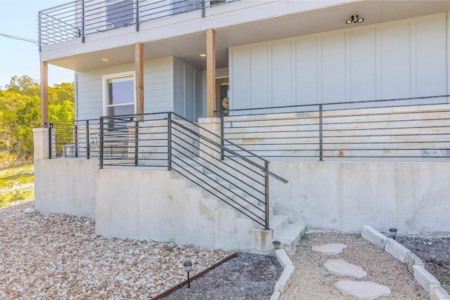 206 Damar Cv, Canyon Lake, TX 78133 - property entrance with board and batten siding
