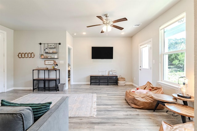 206 Damar Cv, Canyon Lake, TX 78133 - living room with light wood-style flooring, ceiling fan, visible vents, and recessed lighting