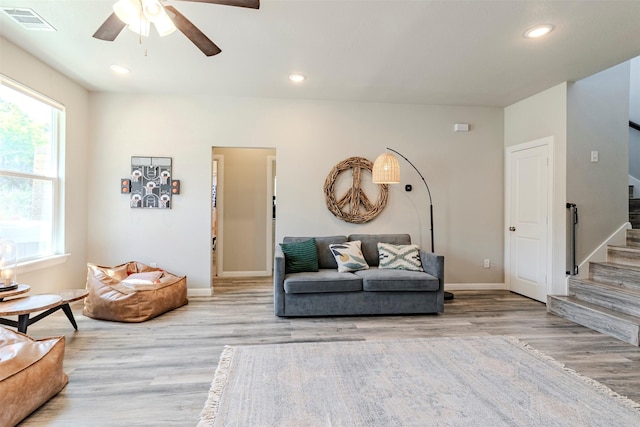 206 Damar Cv, Canyon Lake, TX 78133 - living area with ceiling fan, visible vents, recessed lighting, stairway, and wood finished floors