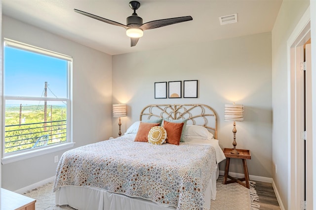 206 Damar Cv, Canyon Lake, TX 78133 - bedroom featuring light wood-style floors, baseboards, a ceiling fan, and visible vents