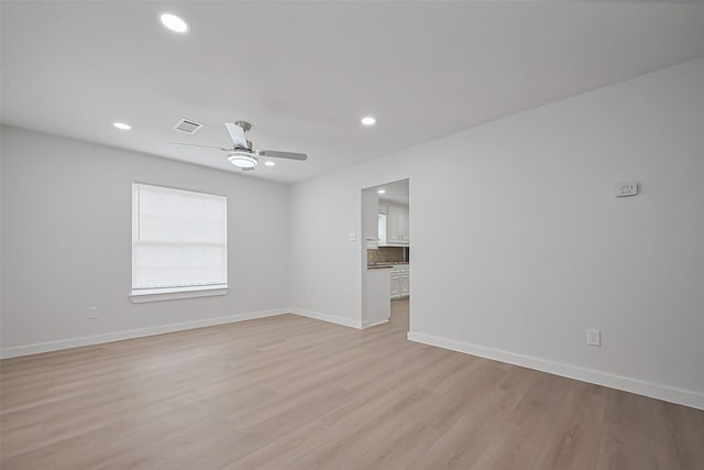 unfurnished living room featuring visible vents, baseboards, ceiling fan, light wood-type flooring, and recessed lighting