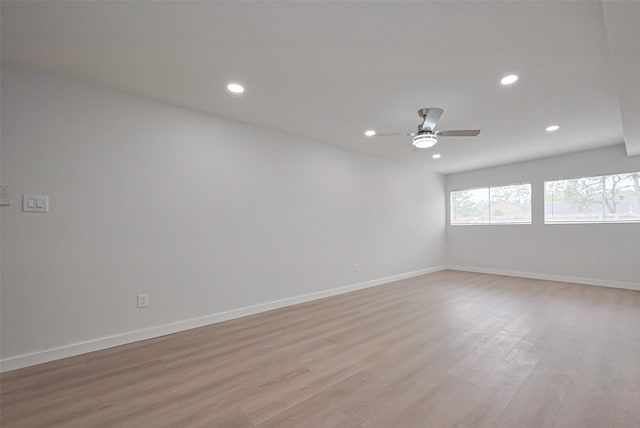 unfurnished room featuring ceiling fan, recessed lighting, light wood-style floors, and baseboards