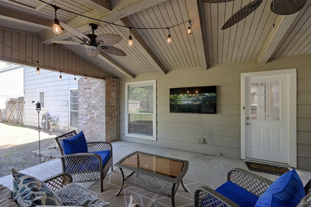 view of patio / terrace with an outdoor living space and a ceiling fan