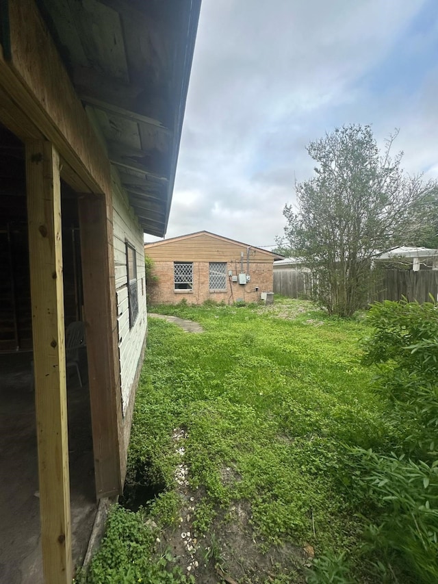 view of yard with fence