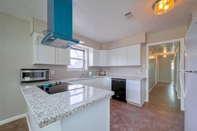 111 N 11th St, Highlands, TX 77562 - kitchen with black appliances, a sink, island range hood, a peninsula, and white cabinets