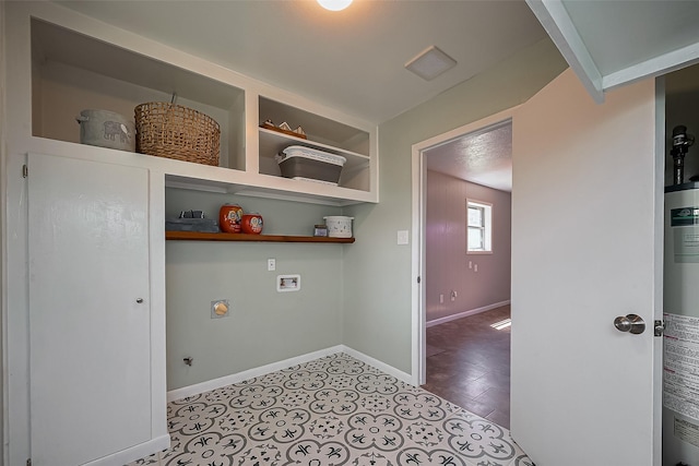 111 N 11th St, Highlands, TX 77562 - washroom featuring hookup for a washing machine, water heater, baseboards, and hookup for an electric dryer