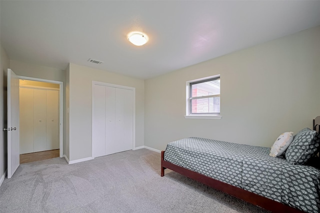 111 N 11th St, Highlands, TX 77562 - carpeted bedroom with baseboards and a closet