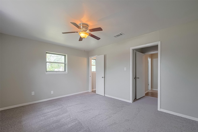 111 N 11th St, Highlands, TX 77562 - carpeted spare room featuring ceiling fan and baseboards