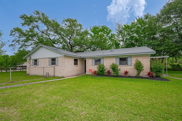 111 N 11th St, Highlands, TX 77562 - view of front of home featuring brick siding