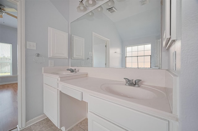 19915 Hardsville Dr, Spring, TX 77388 - full bathroom featuring plenty of natural light, double vanity, ceiling fan, and vaulted ceiling