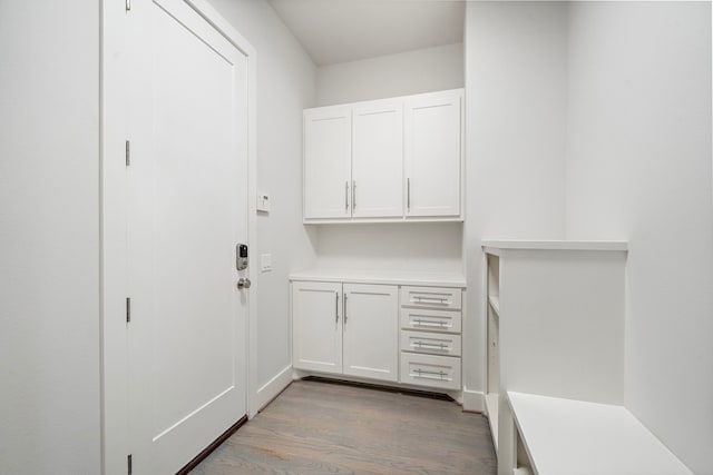 mudroom with light wood-style floors