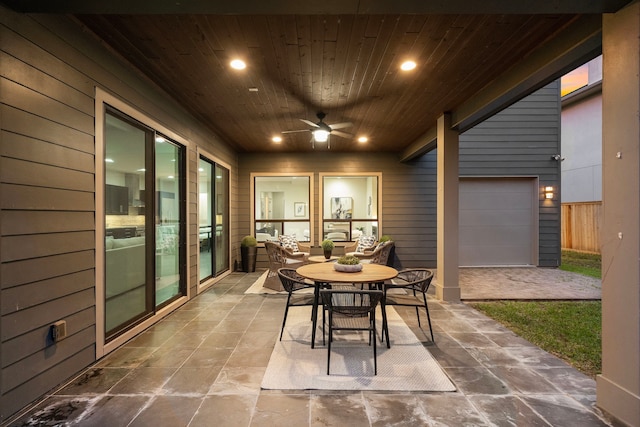 view of patio / terrace featuring outdoor dining area and a ceiling fan