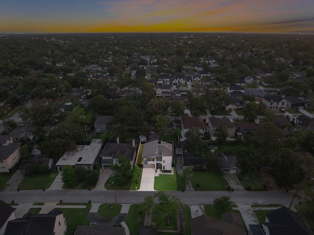 aerial view at dusk with a residential view