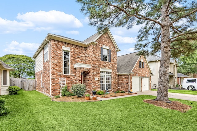 traditional-style house with brick siding, fence, driveway, and a front yard