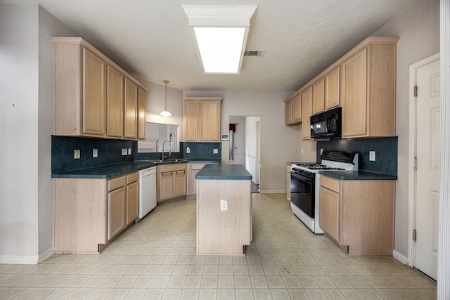 kitchen with light brown cabinetry, range with gas cooktop, visible vents, white dishwasher, and black microwave