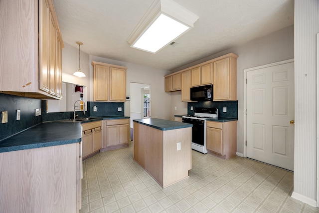 kitchen with range with gas cooktop, dark countertops, light brown cabinets, a sink, and black microwave