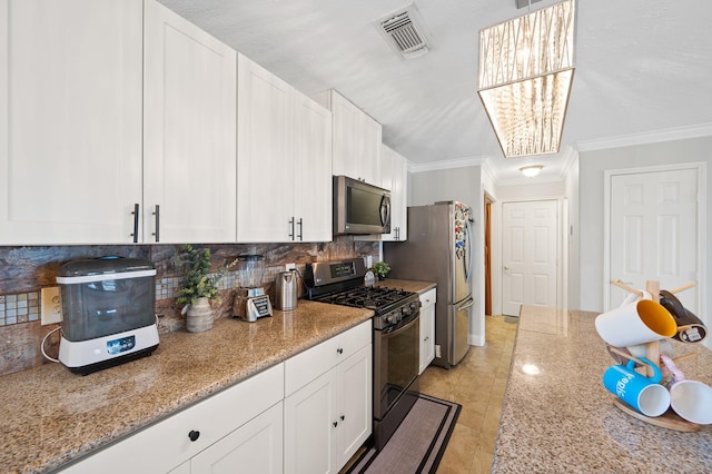 14942 Gray Ridge Dr, Houston, TX 77082 - kitchen with tasteful backsplash, ornamental molding, visible vents, white cabinetry, and appliances with stainless steel finishes