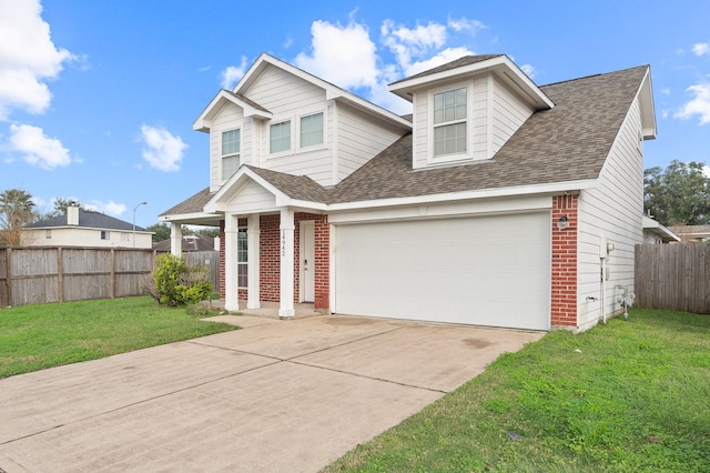 14942 Gray Ridge Dr, Houston, TX 77082 - view of front of property with brick siding, roof with shingles, fence, and concrete driveway
