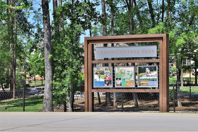 view of community with fence