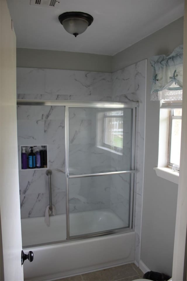 full bath featuring visible vents and enclosed tub / shower combo