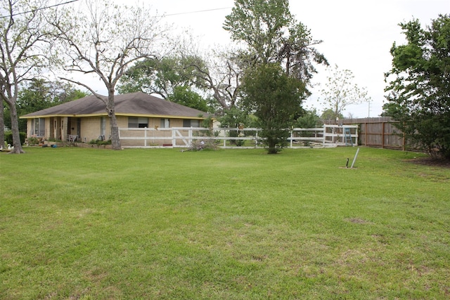 view of yard with fence