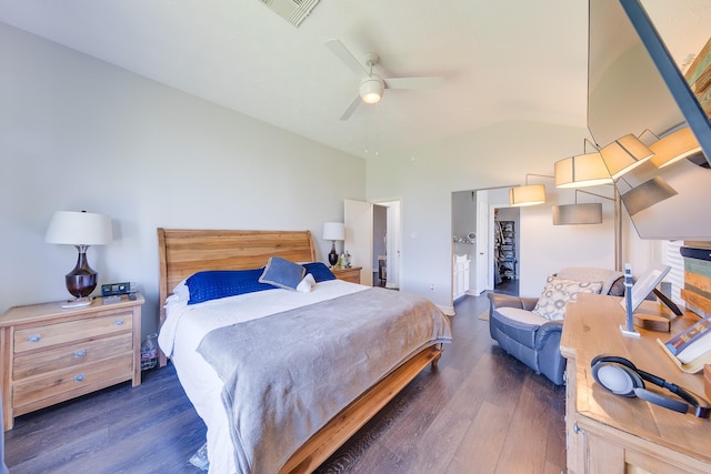 bedroom with wood finished floors, ceiling fan, visible vents, and high vaulted ceiling