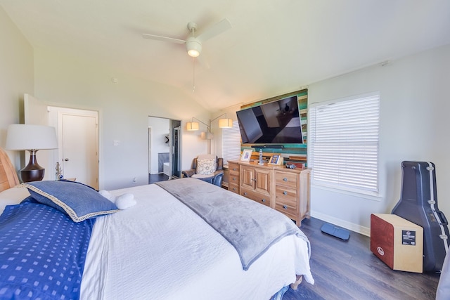 bedroom featuring baseboards, vaulted ceiling, a ceiling fan, and wood finished floors