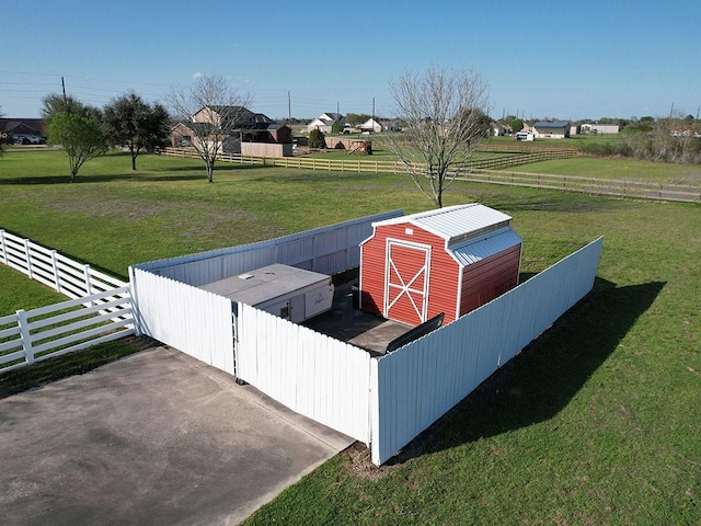 view of outdoor structure featuring an outdoor structure and fence