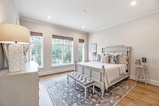 3028 Locke Ln, Houston, TX 77019 - bedroom featuring light wood-type flooring, ornamental molding, baseboards, and recessed lighting