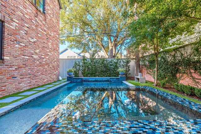3028 Locke Ln, Houston, TX 77019 - view of swimming pool featuring a fenced backyard