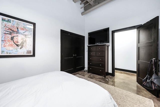 bedroom with concrete flooring