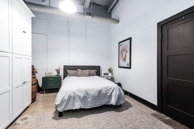 bedroom featuring visible vents