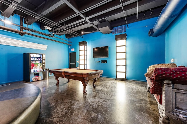 playroom with concrete floors, pool table, and baseboards