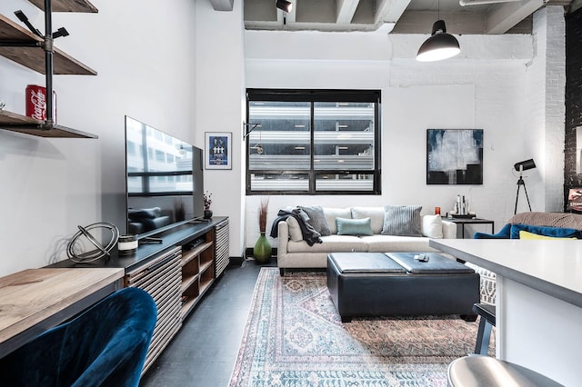 living area with a high ceiling