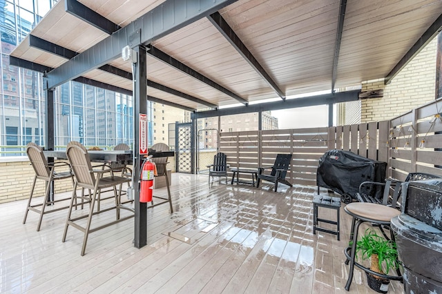 exterior space with fence and a deck
