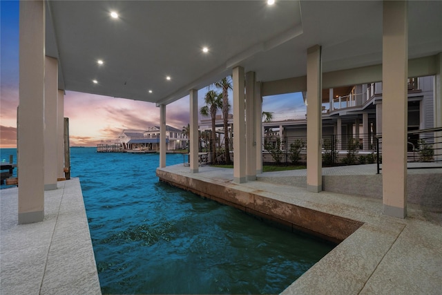 1303 Oahu Dr, Tiki Island, TX 77554 - patio terrace at dusk with a water view
