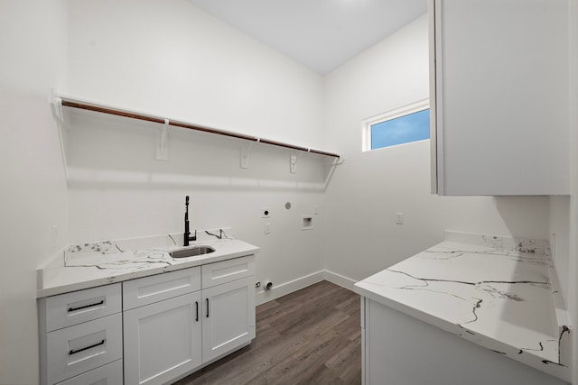 1303 Oahu Dr, Tiki Island, TX 77554 - clothes washing area featuring hookup for an electric dryer, washer hookup, cabinet space, baseboards, and dark wood-type flooring