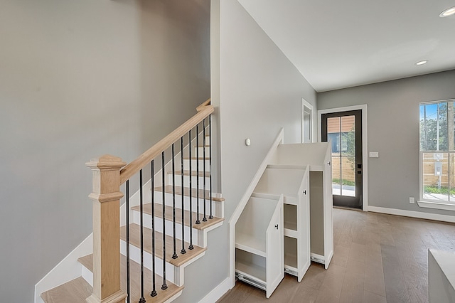 1420 Weiss St, Houston, TX 77009 - staircase featuring wood finished floors, baseboards, and recessed lighting