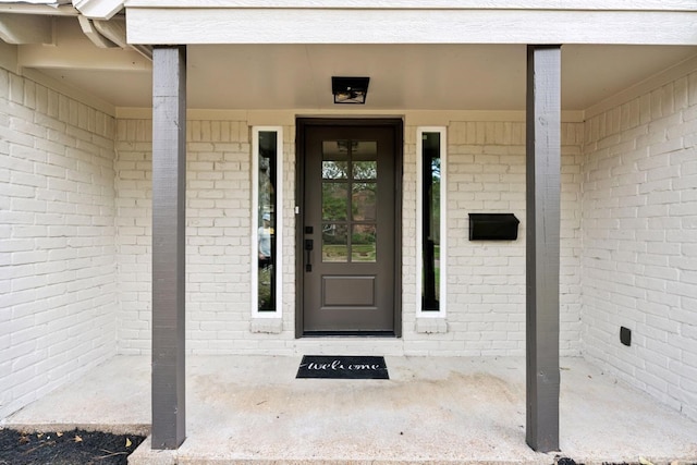 5606 Arbor Vitae Dr, Houston, TX 77092 - doorway to property featuring brick siding