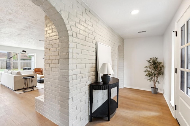 5606 Arbor Vitae Dr, Houston, TX 77092 - hall featuring light wood-style floors and baseboards