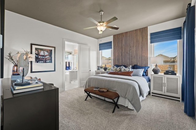 500 Dove Meadow Ln, Katy, TX 77493 - carpeted bedroom with connected bathroom and a ceiling fan