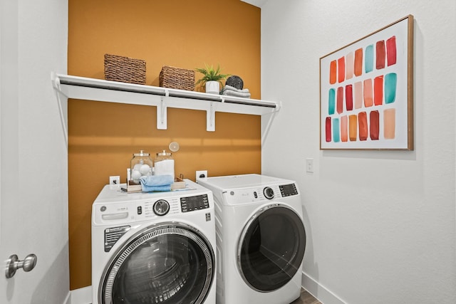 500 Dove Meadow Ln, Katy, TX 77493 - laundry room featuring washing machine and dryer and baseboards