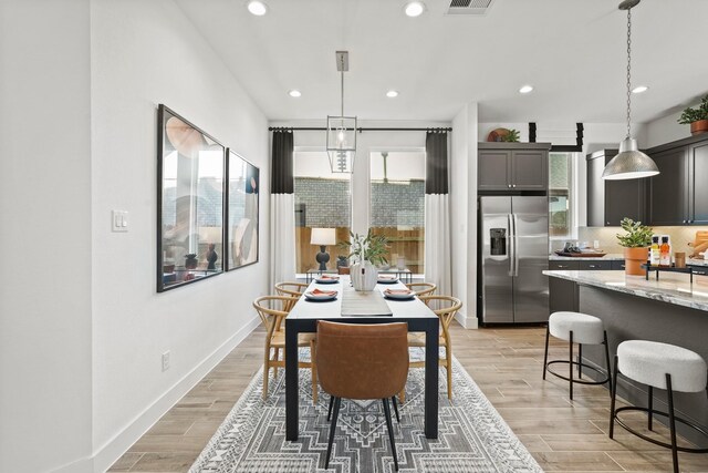 500 Dove Meadow Ln, Katy, TX 77493 - dining room with light wood-style floors, recessed lighting, and baseboards