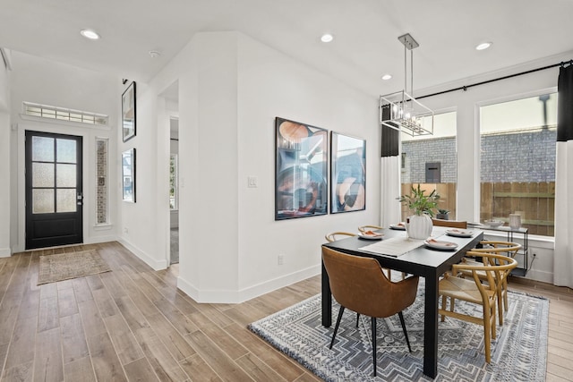 500 Dove Meadow Ln, Katy, TX 77493 - dining area with light wood-style flooring, recessed lighting, baseboards, and a chandelier