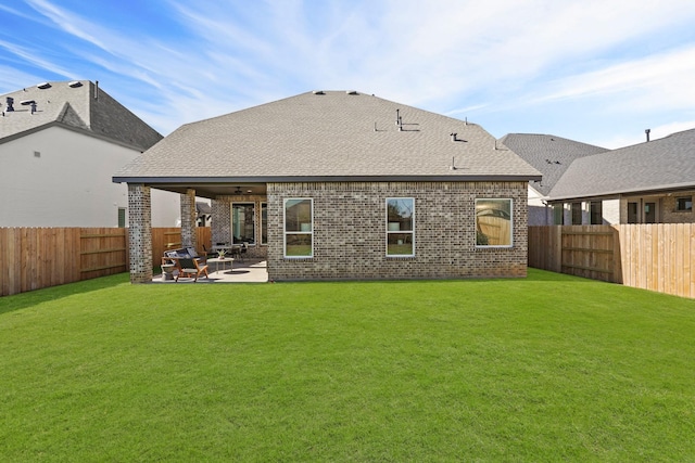 500 Dove Meadow Ln, Katy, TX 77493 - rear view of property with brick siding, a patio area, roof with shingles, and ceiling fan
