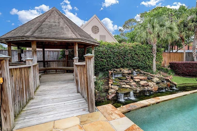 5768 Sugar Hill Dr, Houston, TX 77057 - dock area featuring a gazebo and fence
