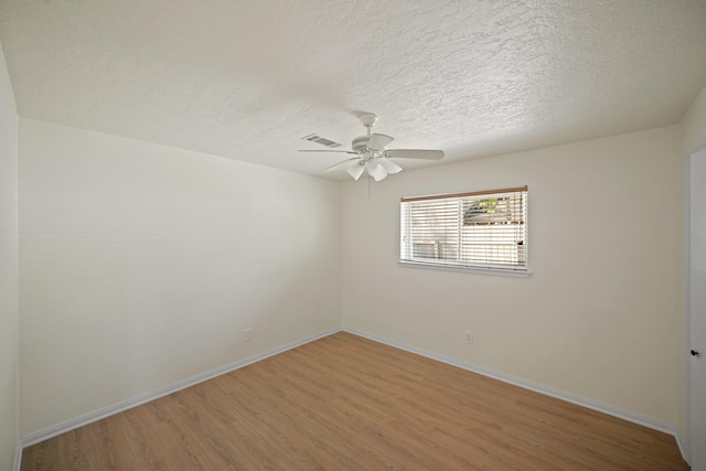 13510 Cedar Point Dr, Cypress, TX 77429 - unfurnished room with light wood finished floors, baseboards, a ceiling fan, and visible vents